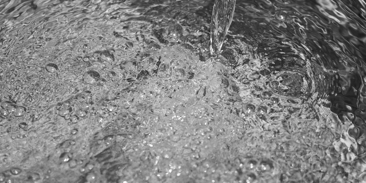 water splash on body of water