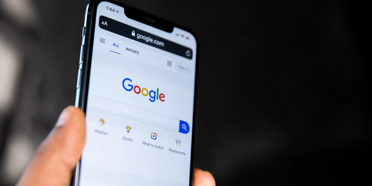 person holding black android smartphone
