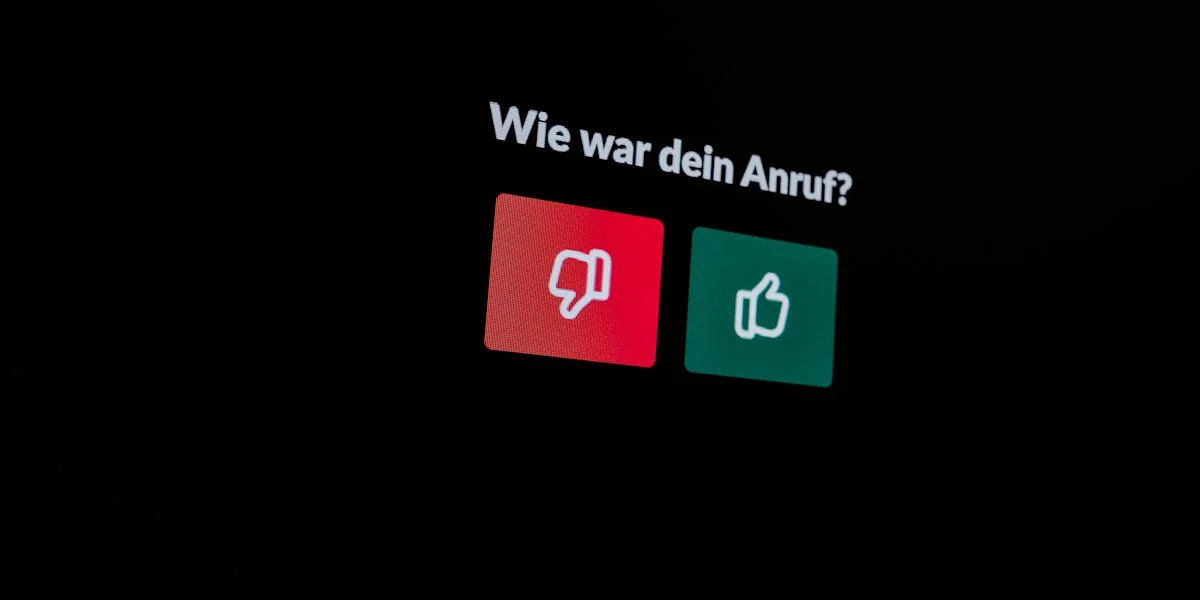 a black background with a red and green sign