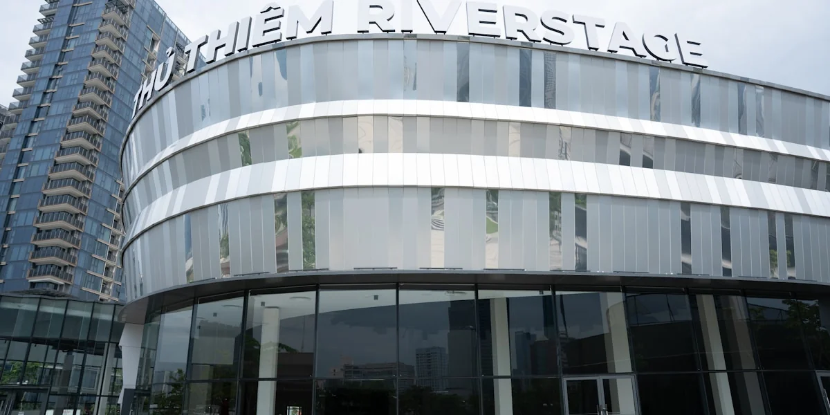 Modern building with glass facade and text