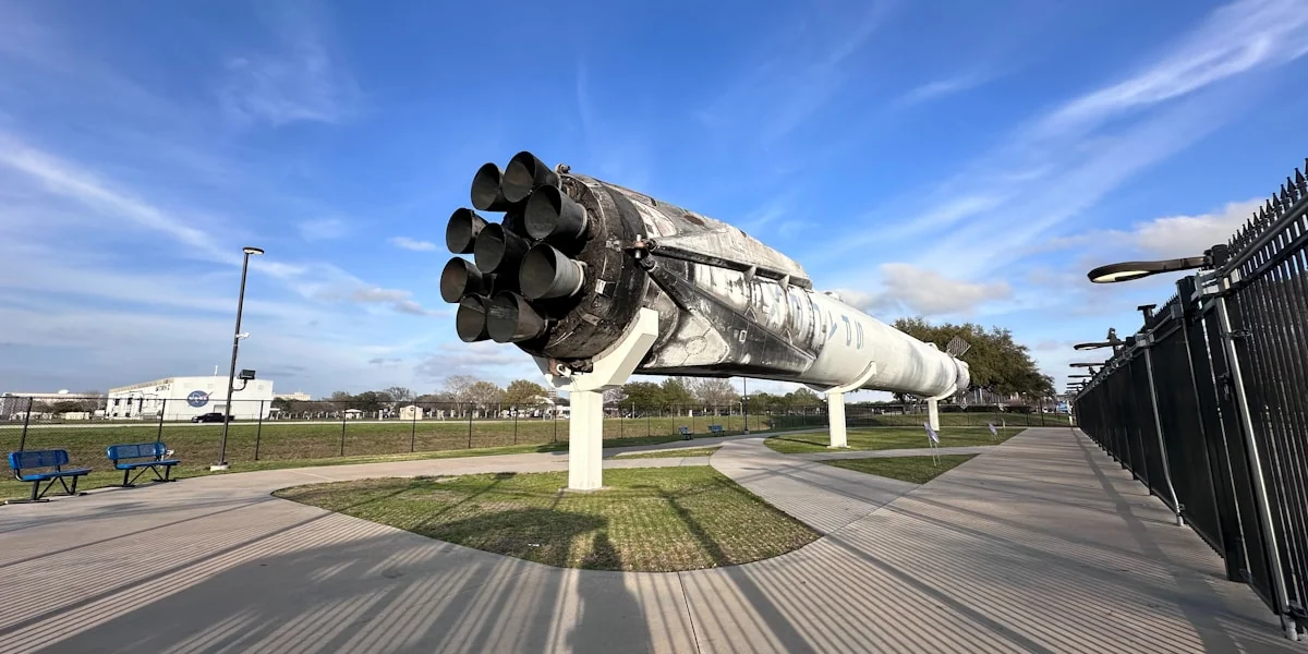 a large metal object sitting on top of a sidewalk