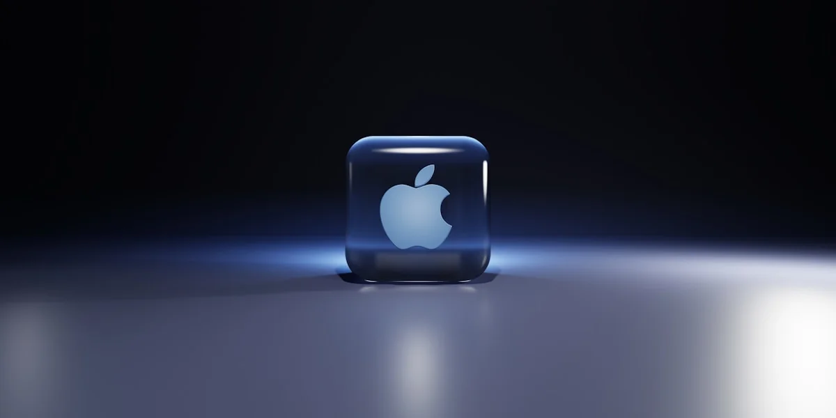 a small blue cube with a white logo on it