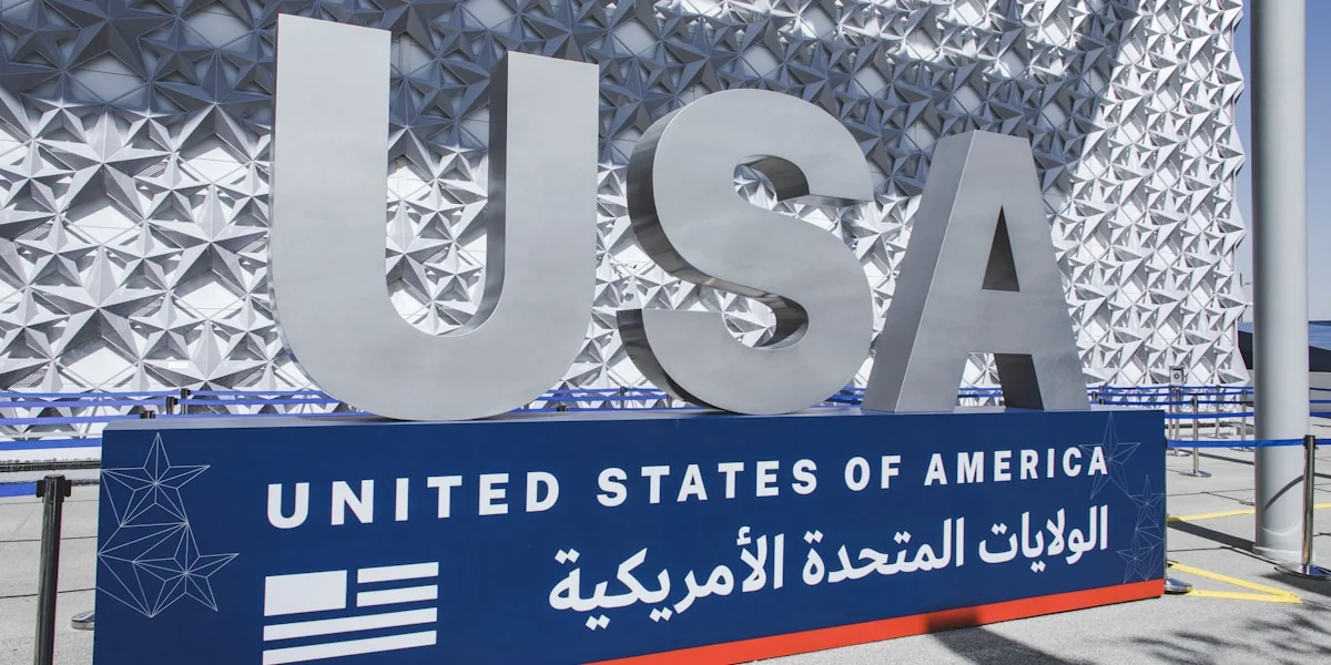 the united states of america sign in front of a building
