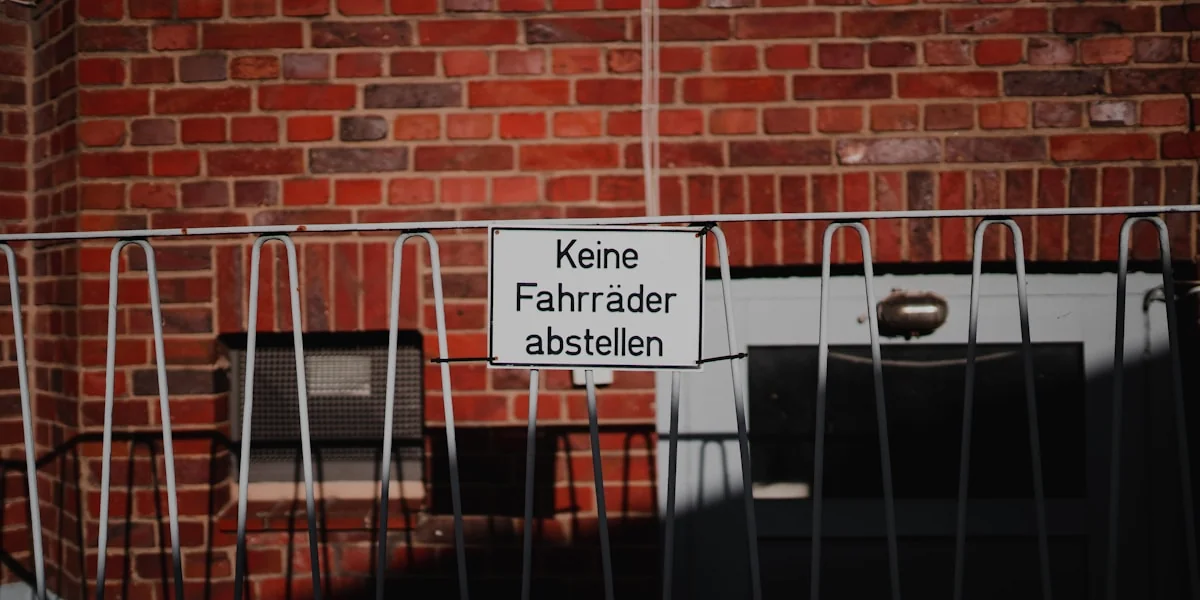 white and black wooden signage