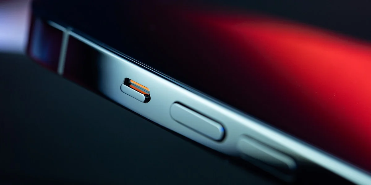 silver iphone 6 on red surface