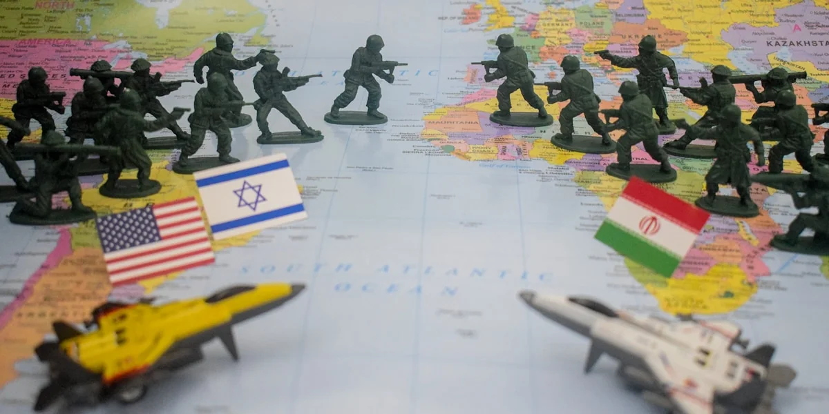 Toy soldiers and flags on world map
