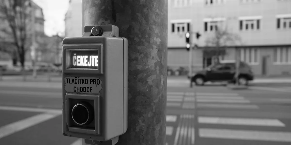 a black and white photo of a parking meter