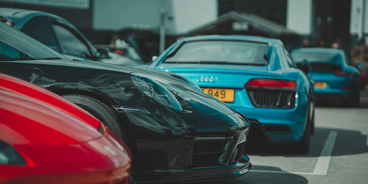 A bunch of cars parked in a parking lot