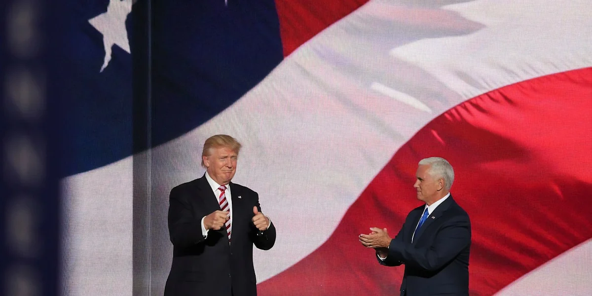 Donald Trump beside man in black suit
