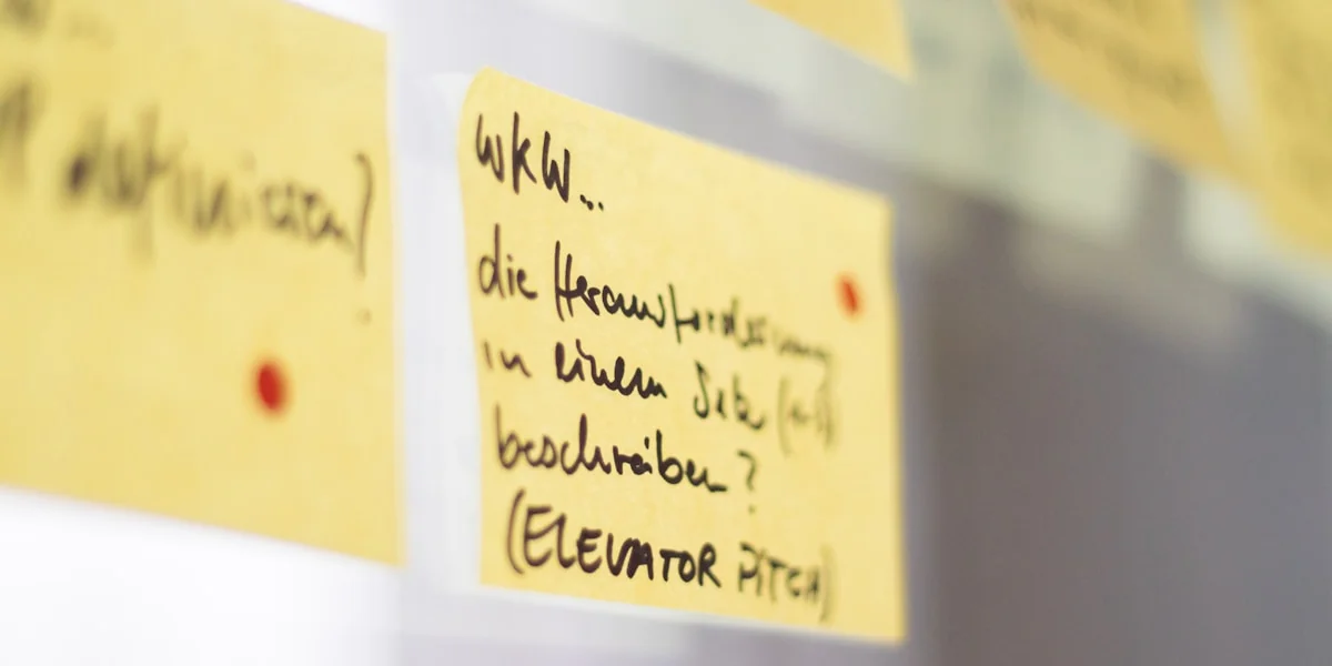 yellow sticky notes on white wall