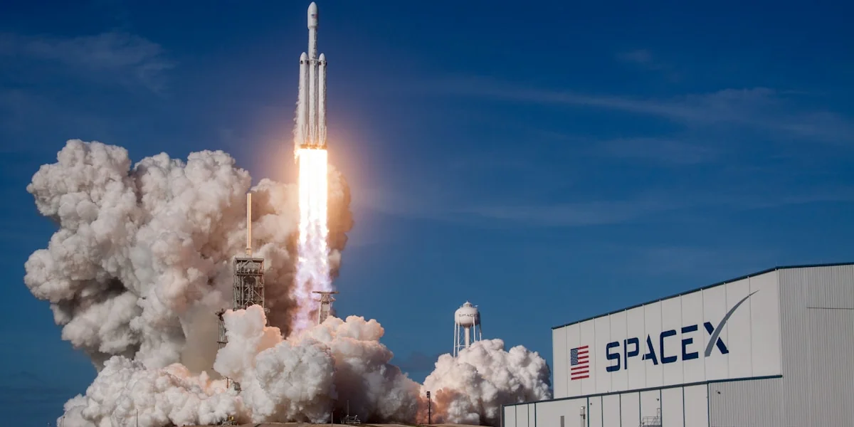 rocket ship launching during daytime