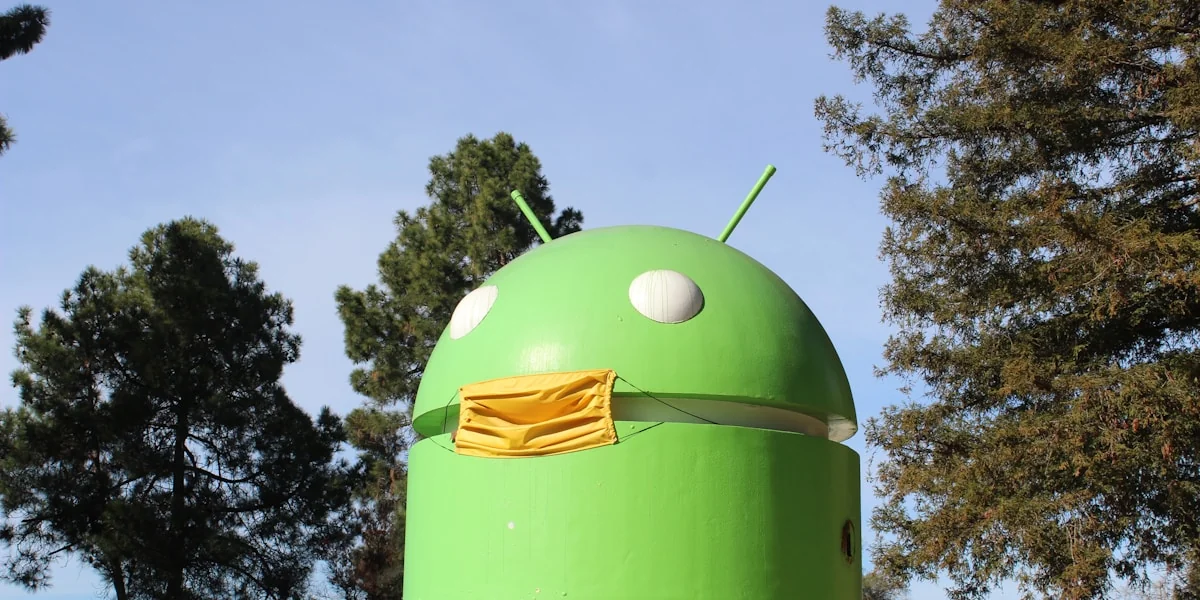 a large green object with a yellow cloth on it