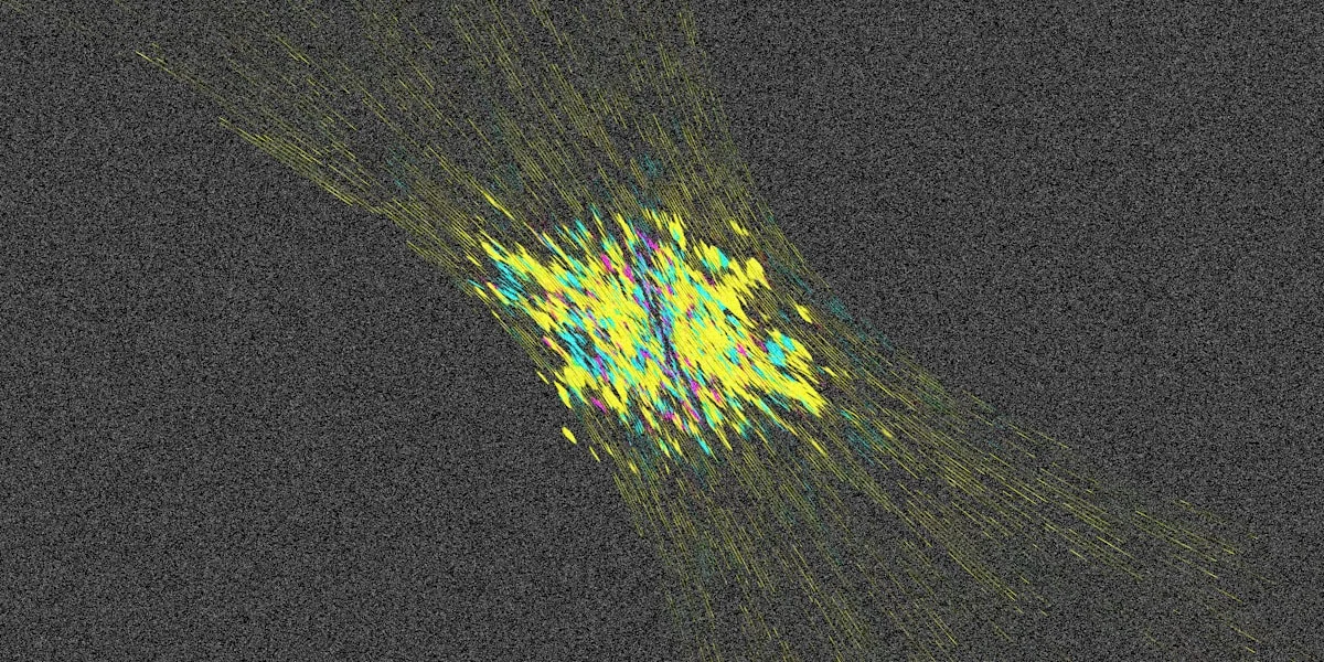 Abstract colorful streaks of light against dark background