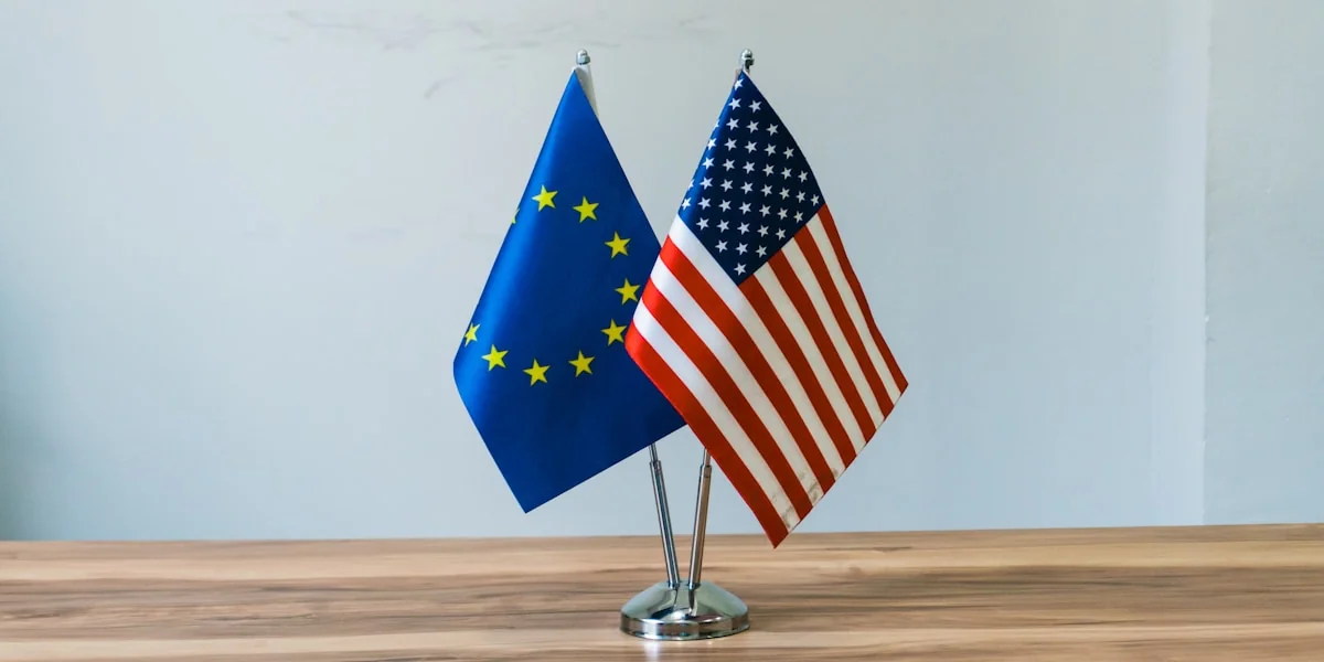European union and us flags on a table