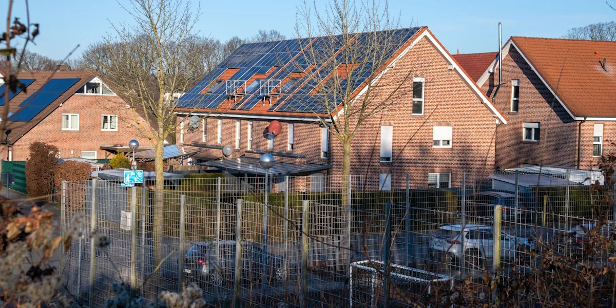 Brick houses with solar panels on roof