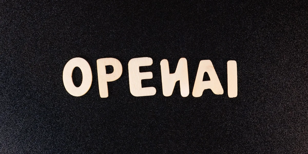 a close up of a black surface with white letters