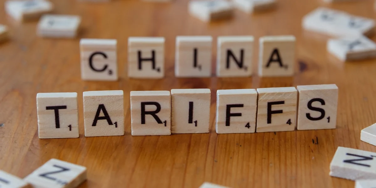 A close up of scrabble tiles spelling the word china tarifs