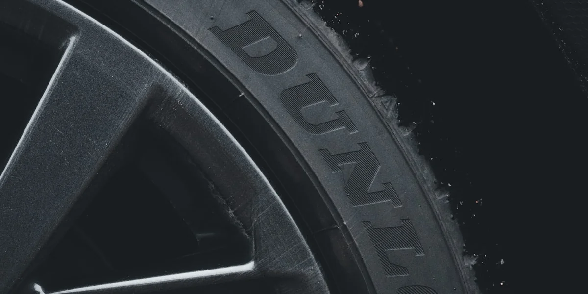 a close up of a tire on a car
