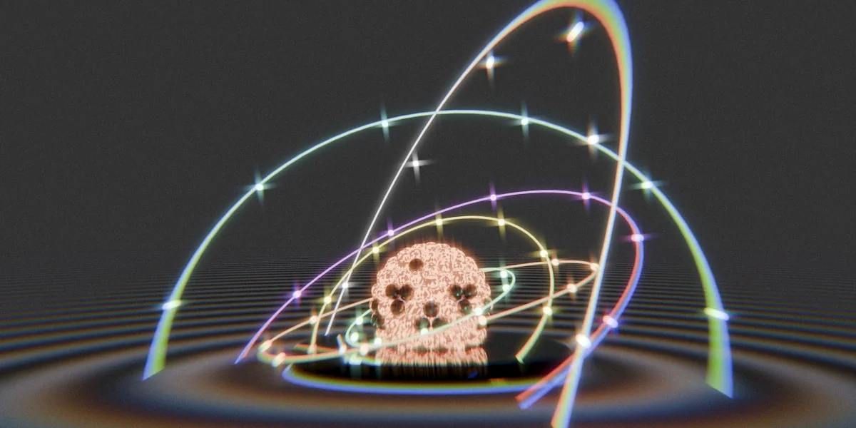 Abstract skull surrounded by glowing, colorful orbits and sparkles.