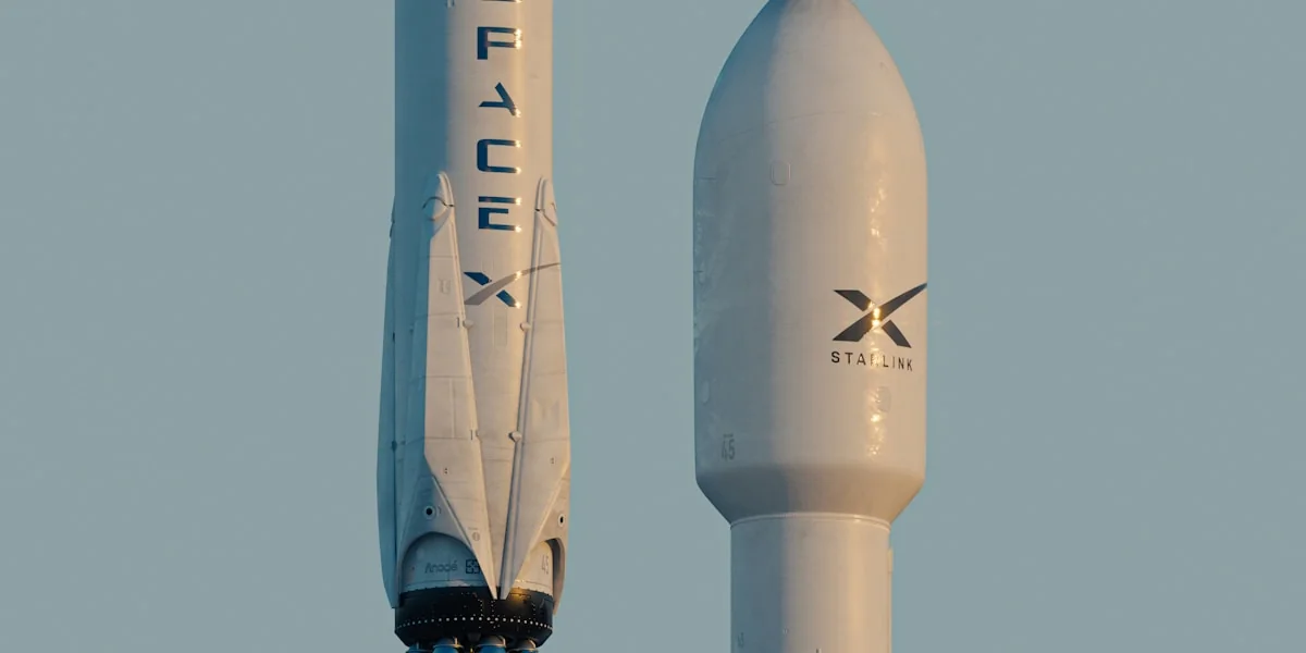 a spacex rocket is flying in the sky