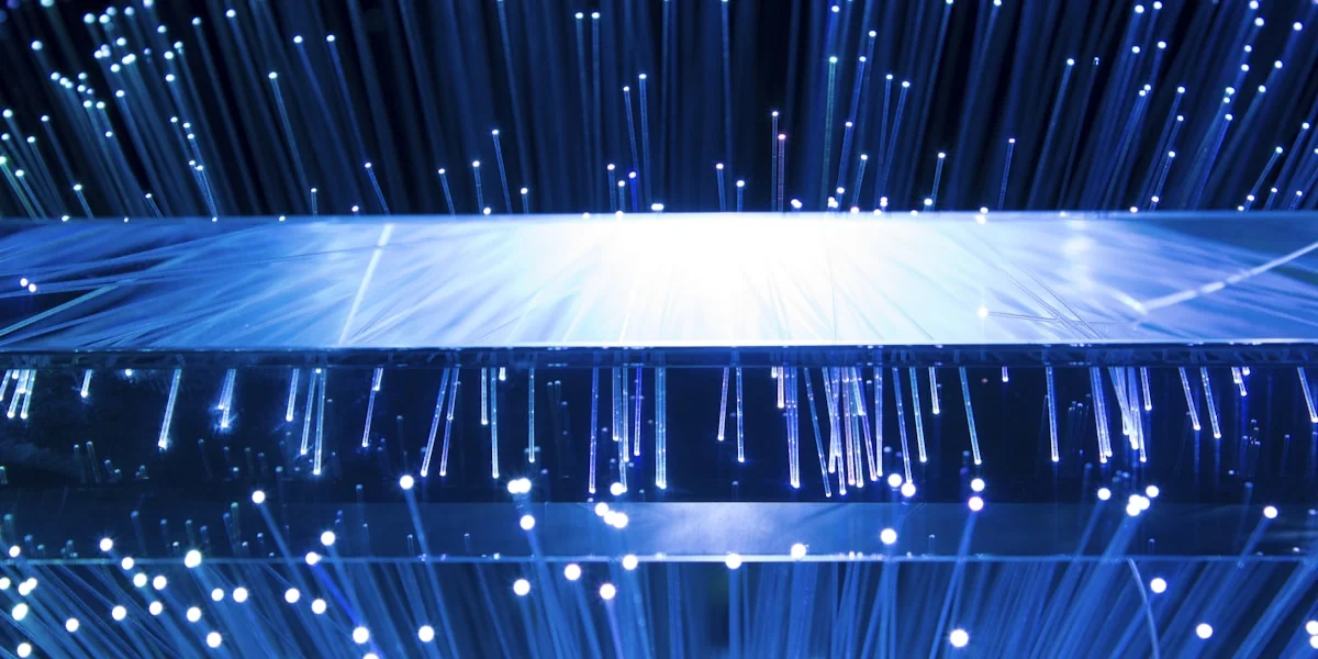 a large display of blue lights in a dark room
