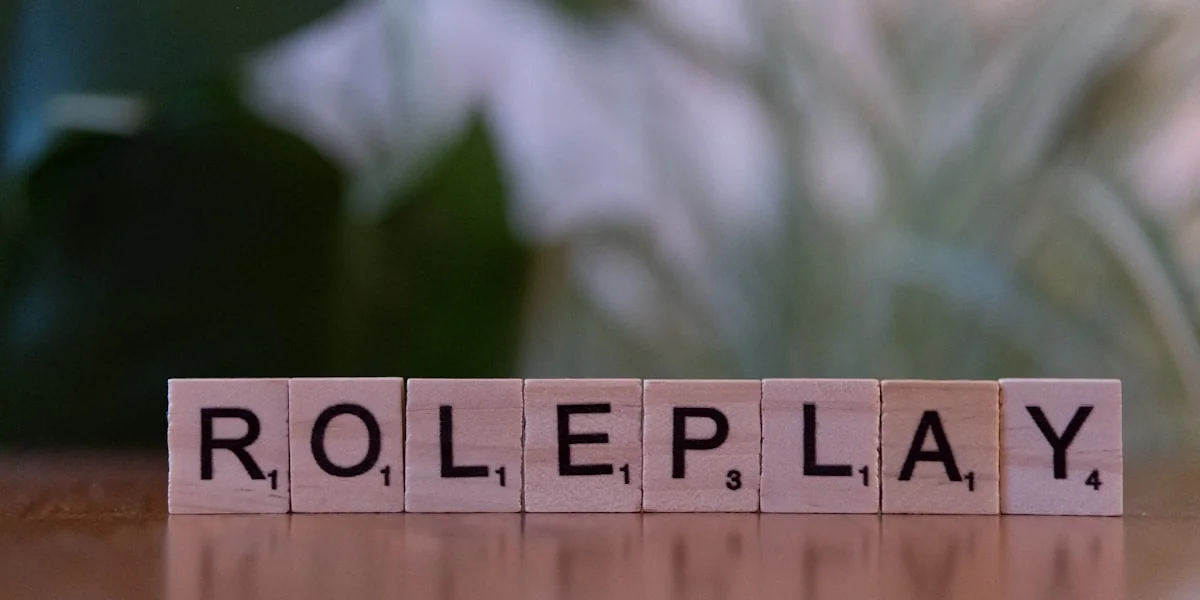 A wooden block spelling role play on a table