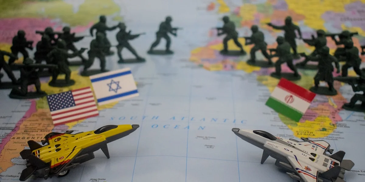 Toy soldiers and jets arranged on a world map