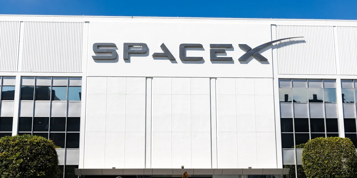 a building with a sign that says spacex on it
