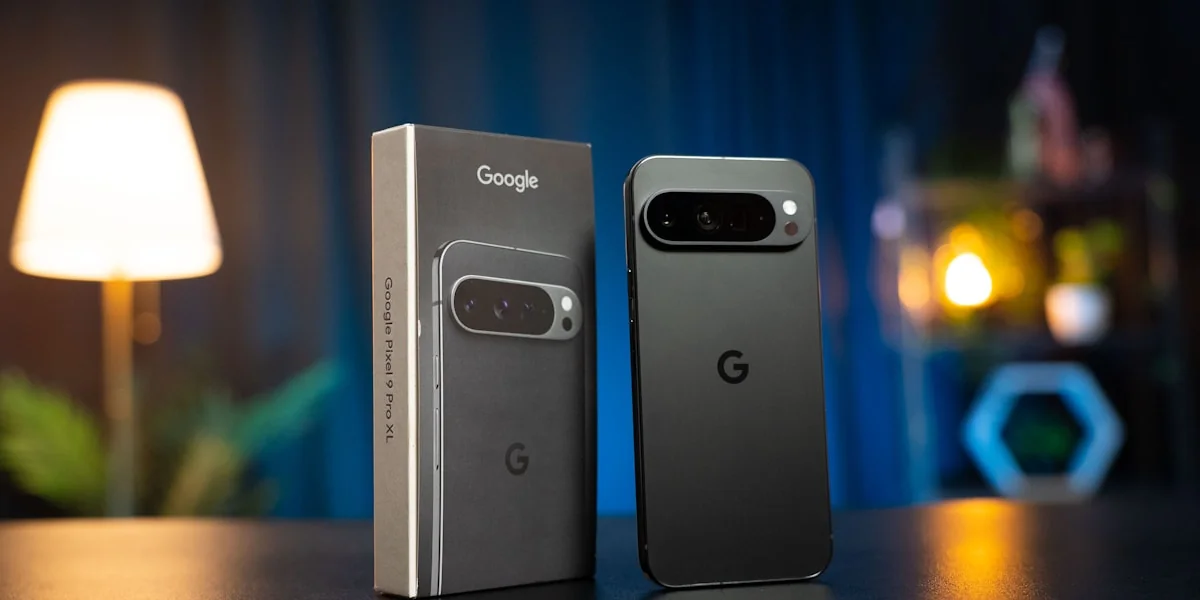 Two cell phones sitting next to each other on a table