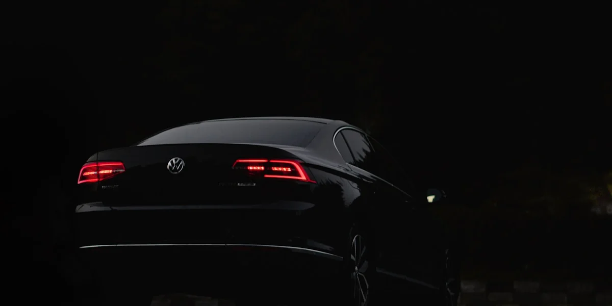 black porsche 911 parked on road during nighttime