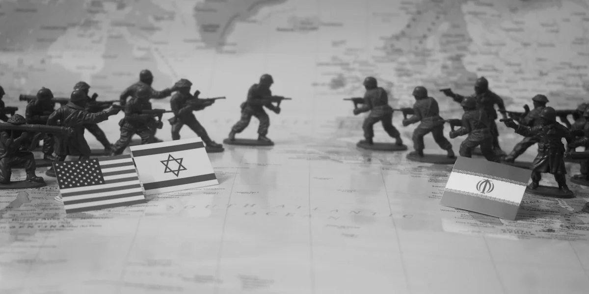 Toy soldiers facing each other with flags on map